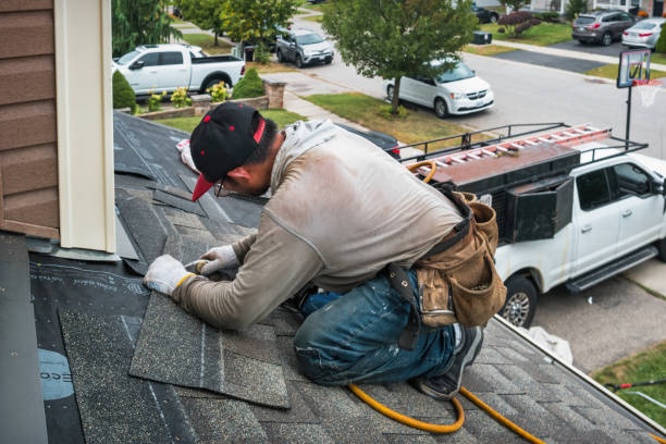 Professional Commercial Roofing technician working in Wauregan, CT